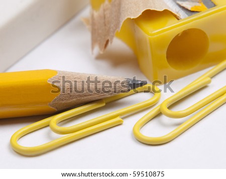 shot of eraser,  pencil and  pencil yellow sharpener