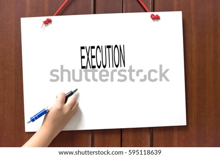 EXECUTION -  Hand writing word to represent the meaning of Business word as concept.