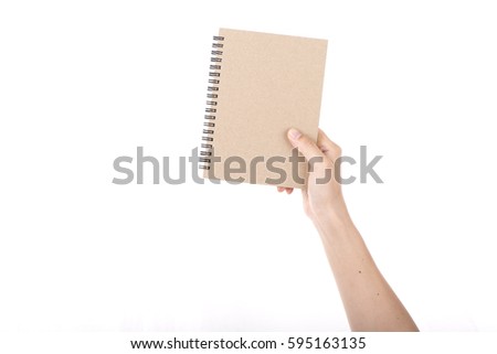 woman's hand showing blank book