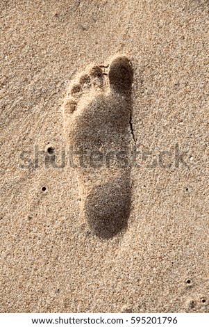 footprint on the sand. Sand texture.