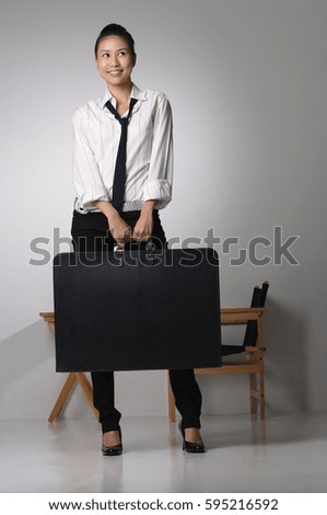 Young woman with portfolio