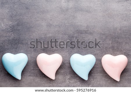Valentines day greeting card. Colored heart on the gray background. View from above. Flat lay. 