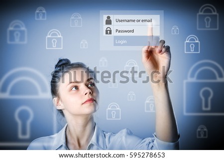 Girl in white is pushing the virtual button. Log in and password concept. Young slim woman.