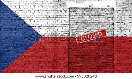 Czech Republic flag on brick wall with bricked door and Closed sign