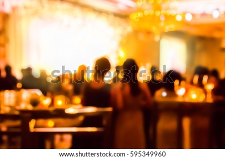 blur people and on gala dinner party in ballroom Royalty-Free Stock Photo #595349960