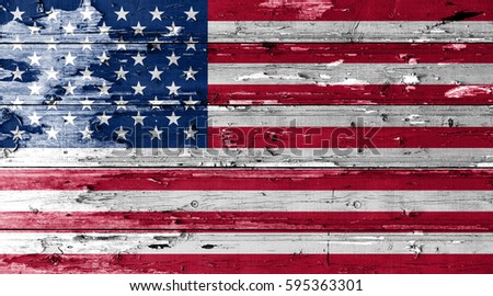 American flag on wood texture background with old paint peels