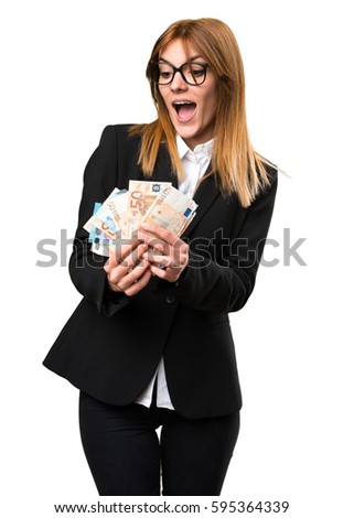 Young business woman taking a lot of money