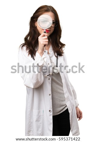 Doctor woman with magnifying glass