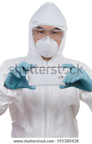 Asian Chinese scientist in protective wear with mobile phone posing for taking photo of evidence in isolated white background.
