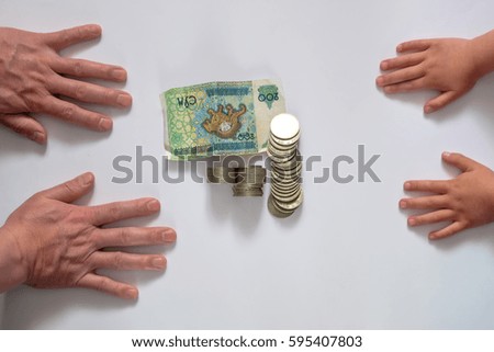 hand holding money isolated on white background