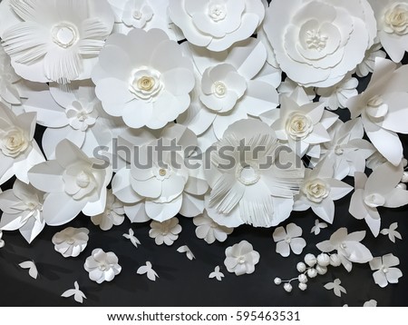 Beautiful Group of Variety Style Handmade Quilling White Floral Pattern with Small Butterfly made from Paper on Black Fabric Wall Background used as Template of Flowers Interior Vintage Retro Style Royalty-Free Stock Photo #595463531