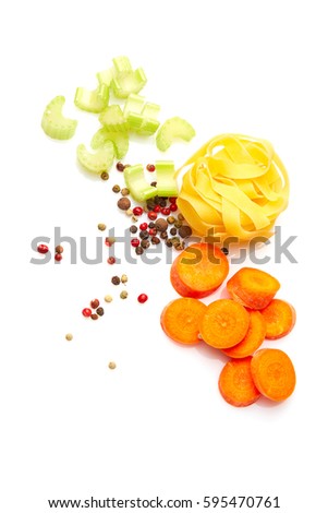 Mediterranean food and drink healthy cuisine: Colorful spicy Italian vegetables, herbs, spices. Celery, carrot, pepper, pasta. Top view. Isolated on white. Royalty-Free Stock Photo #595470761