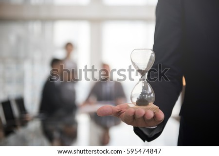 Business Man Hour Glass Time Royalty-Free Stock Photo #595474847