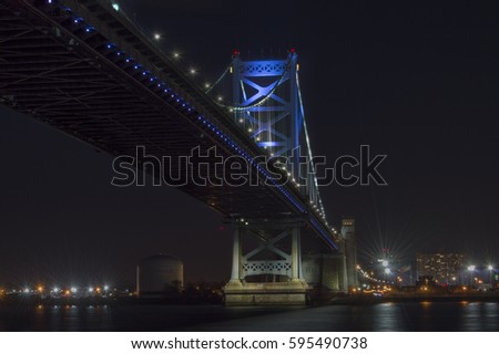 Ben Franklin bridge from the Race Street Pier at night time