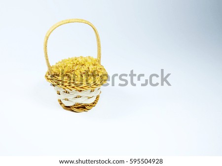 Cracked wheat in a basket on white background. Cuisine choice. Cooking ingredients for healthy diet. 