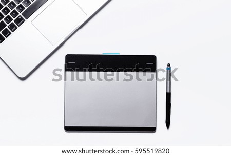 graphic tablet with pen for illustrators and designers, isolated on white background
