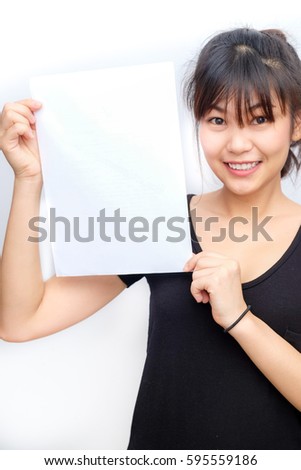 Asian young smiling woman holding blank business paper card on white background