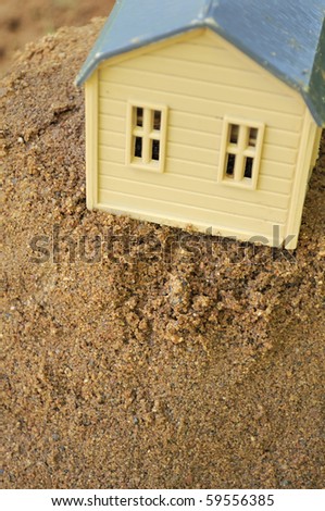 Toy House on Sand