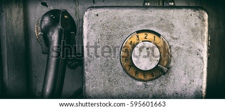 Old payphone Royalty-Free Stock Photo #595601663
