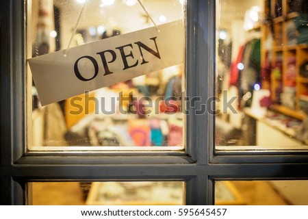 Open signboard on shop door
