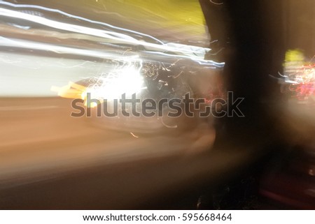 Blur picture of drunker view on the road at night. Light line at night in drunkenness concept.