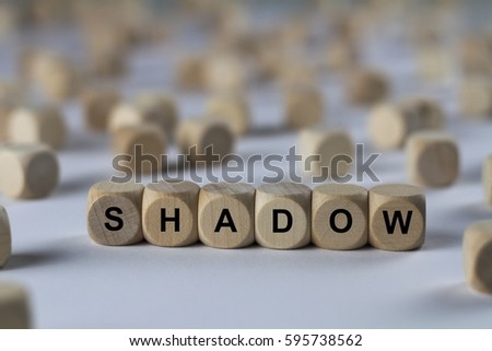 shadow - cube with letters, sign with wooden cubes