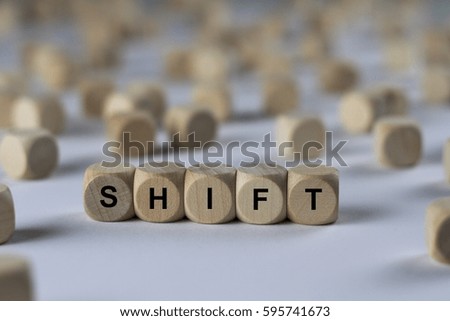 shift - cube with letters, sign with wooden cubes