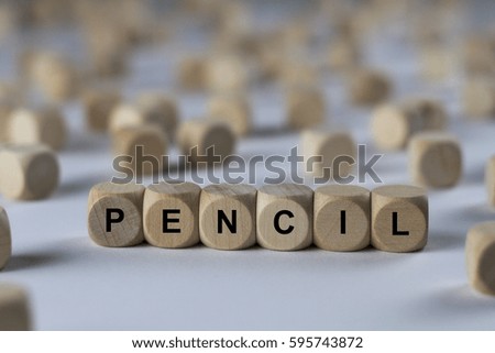 pencil - cube with letters, sign with wooden cubes