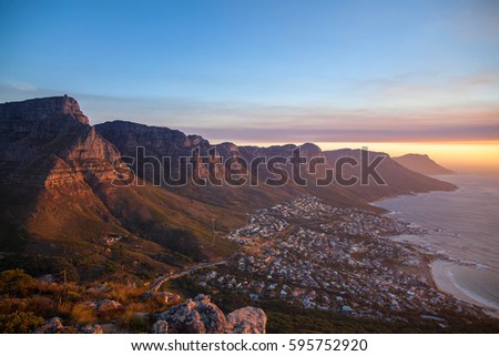 Table Mountain during sunset in Cape Town South Africa Royalty-Free Stock Photo #595752920
