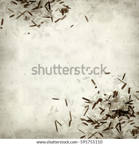textured old paper background with mixture of different rices