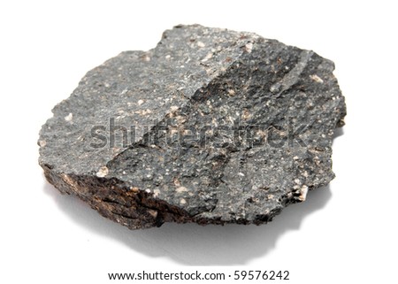 Basalt - a volcanic extrusive rock of mafic composition Royalty-Free Stock Photo #59576242