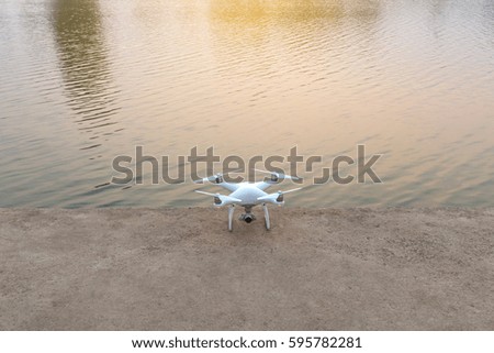 Quad copter or Drone near river