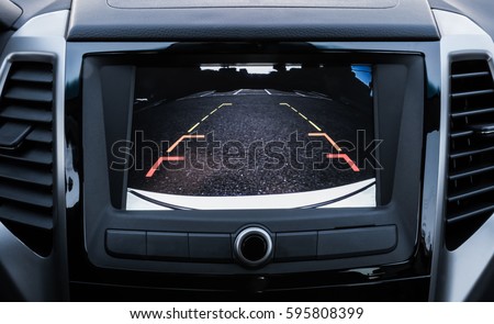 Rear area image showing automobile occurrence/Automotive rear area video camera Royalty-Free Stock Photo #595808399
