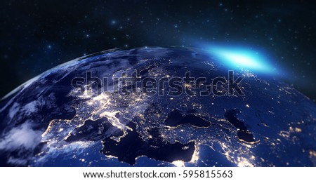 blue planet earth from space showing europe continent at night, globe world with blue glow edge and sun light sunrise on space in a star field background, some elements of this image furnished by NASA Royalty-Free Stock Photo #595815563