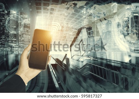 Double exposure of businesswoman hand using smart phone with blur city and network connection technology concept, business strategy concept background.