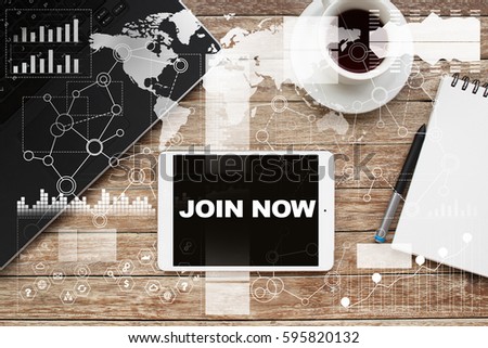 Tablet on desktop with join now text.
