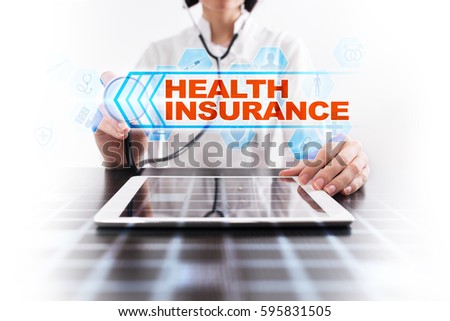 Medical doctor using tablet PC with health insurance medical concept.