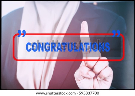 Hand and text  "CONGRATULATIONS" with vintage background. Technology concept.