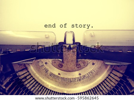 End Of Story  typed words on a Vintage Typewriter. 