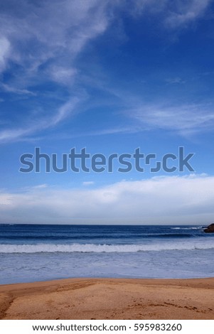 Beach with blue sky in vertical mode