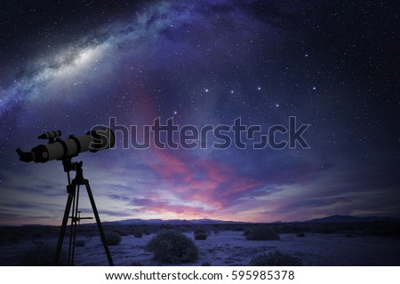 telescope in the desert watching the Great Bear constellation and the milky way Royalty-Free Stock Photo #595985378