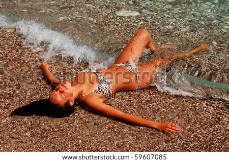 A girl in water on Adriatic beach