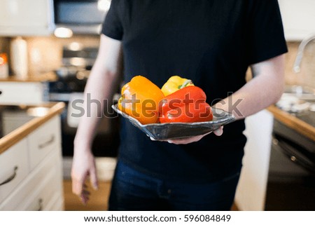 Young man preparing a meal at home