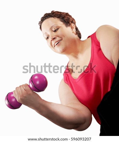 Large woman lifting weights