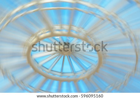 Blue motion blur texture for background. Abstract light effects of stained glass window by low speed shutter and long exposure shot.