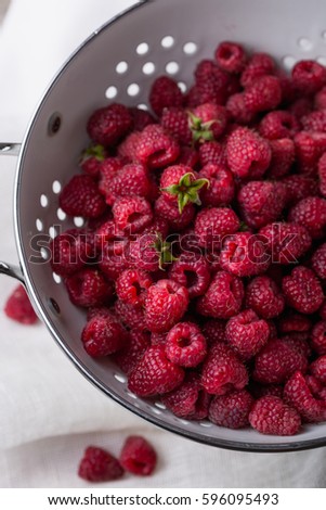Harvest raspberries.