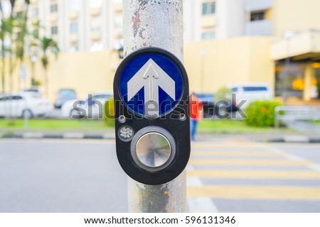 Crosswalk button for pedestrian. Push this button to cross.