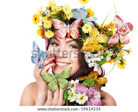 Girl with butterfly and flower. Beauty and fashion.Isolated.