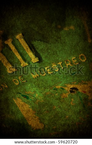 A grunge green wall with white words