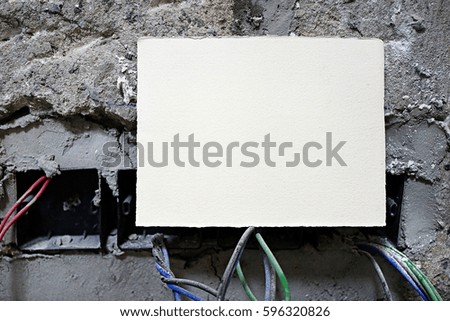 Empty note on construction site background